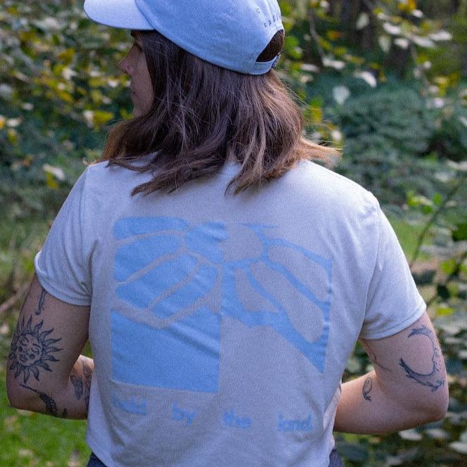 Held by the Land Crop Tee